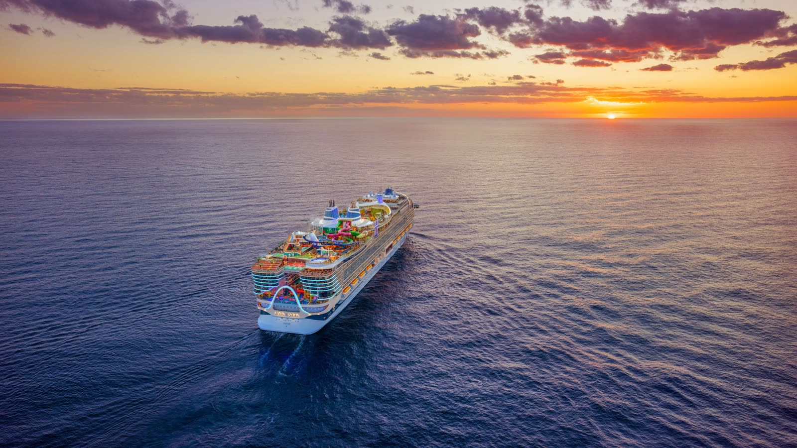 Cruise ship crossing the open Atlantic at sunset